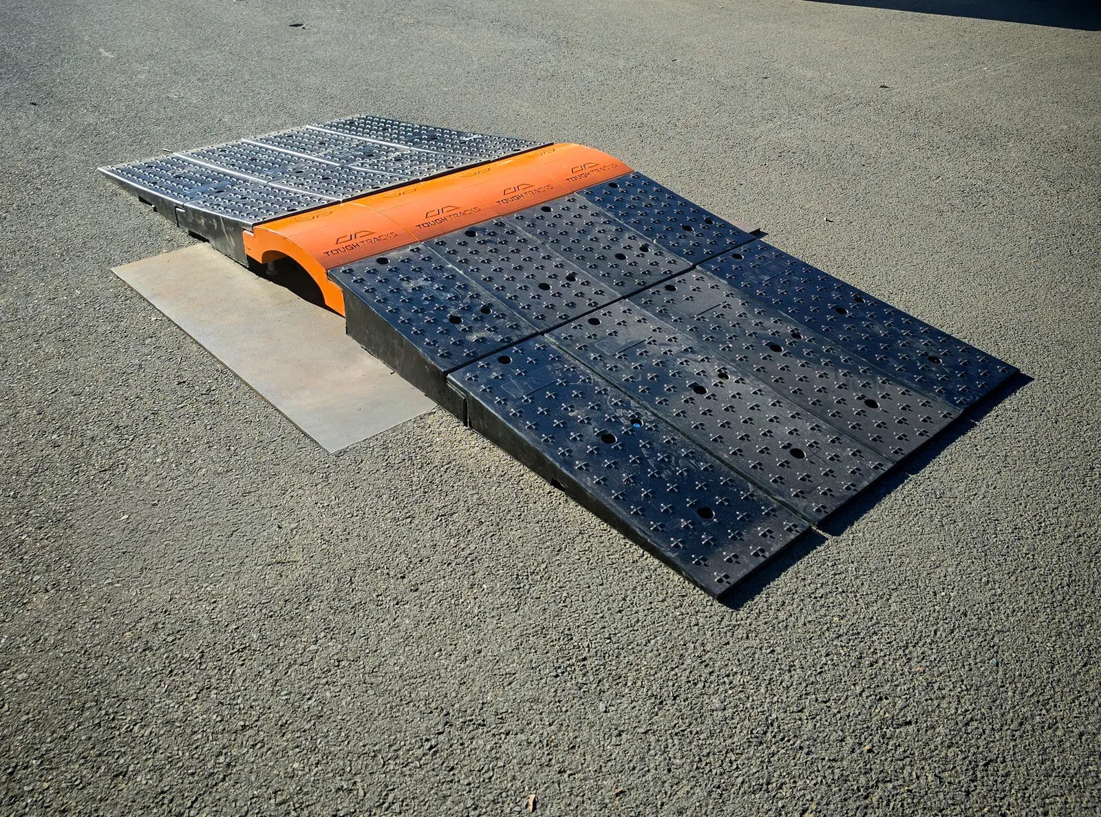 TOUGHERTRACKS 2.0 rubber ramps with structural steel bridge